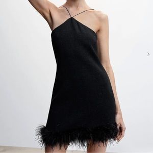 Brand new mango black feather dress. Bought for 142$. Size 4